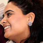 Oxidised finish spiral earring big studs crafted in 925 sterling silver and studded with marcasite stones.