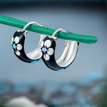 92.5 sterling silver hoops/baali with enamel and printed flowers finished in silver and hinged back closure