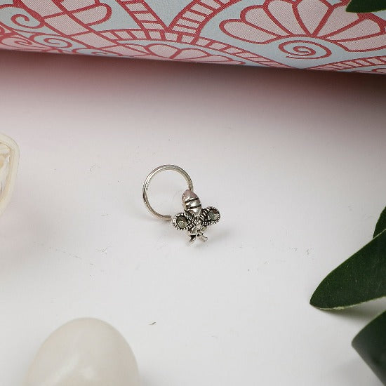 a honeybee motif sterling silver wired nose pin with marcasite stone.