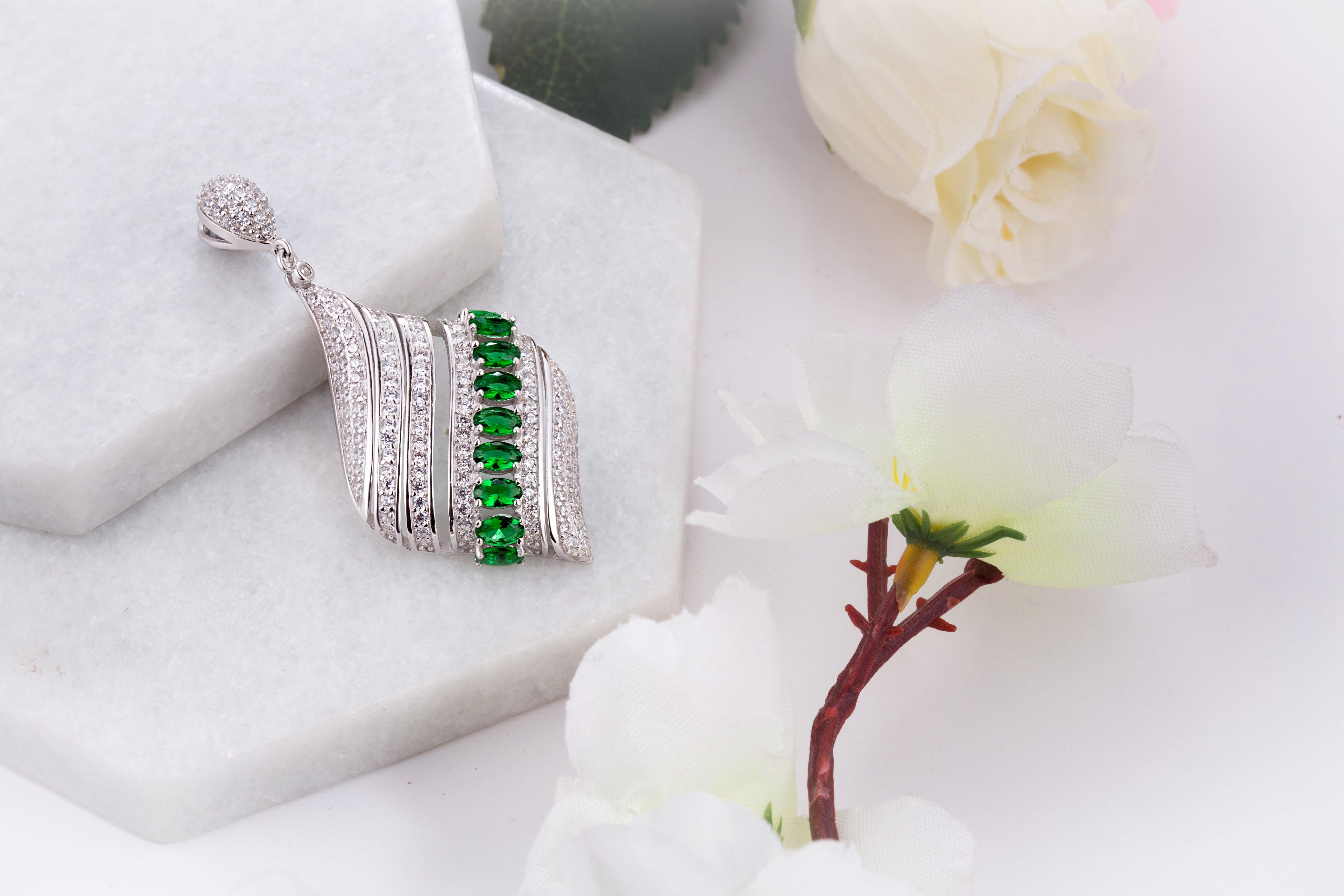 92.5 sterling silver pendant earring set for women studded with zirconias and green color marquise shape stones