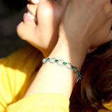 Cosmos Sterling Silver Bracelet for Women with Marcasite and Green Stones