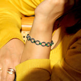 Cosmos Sterling Silver Bracelet for Women with Marcasite and Green Stones