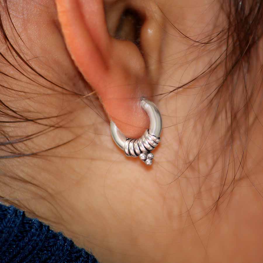 Looking for the perfect minimal bali for everyday wear? Look no further than Zia 925 Sterling Silver Bali! Made from high-quality, 925 sterling silver with an oxidised finish, this bali is not only beautiful but also durable for everyday wear. Elevate your style with Zia.