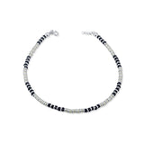 Stay protected with our sterling silver nazariya anklet for women. Featuring white and black beads, this anklet is not only stylish but also wards off the evil eye. Keep positive energy around you with this elegant accessory.