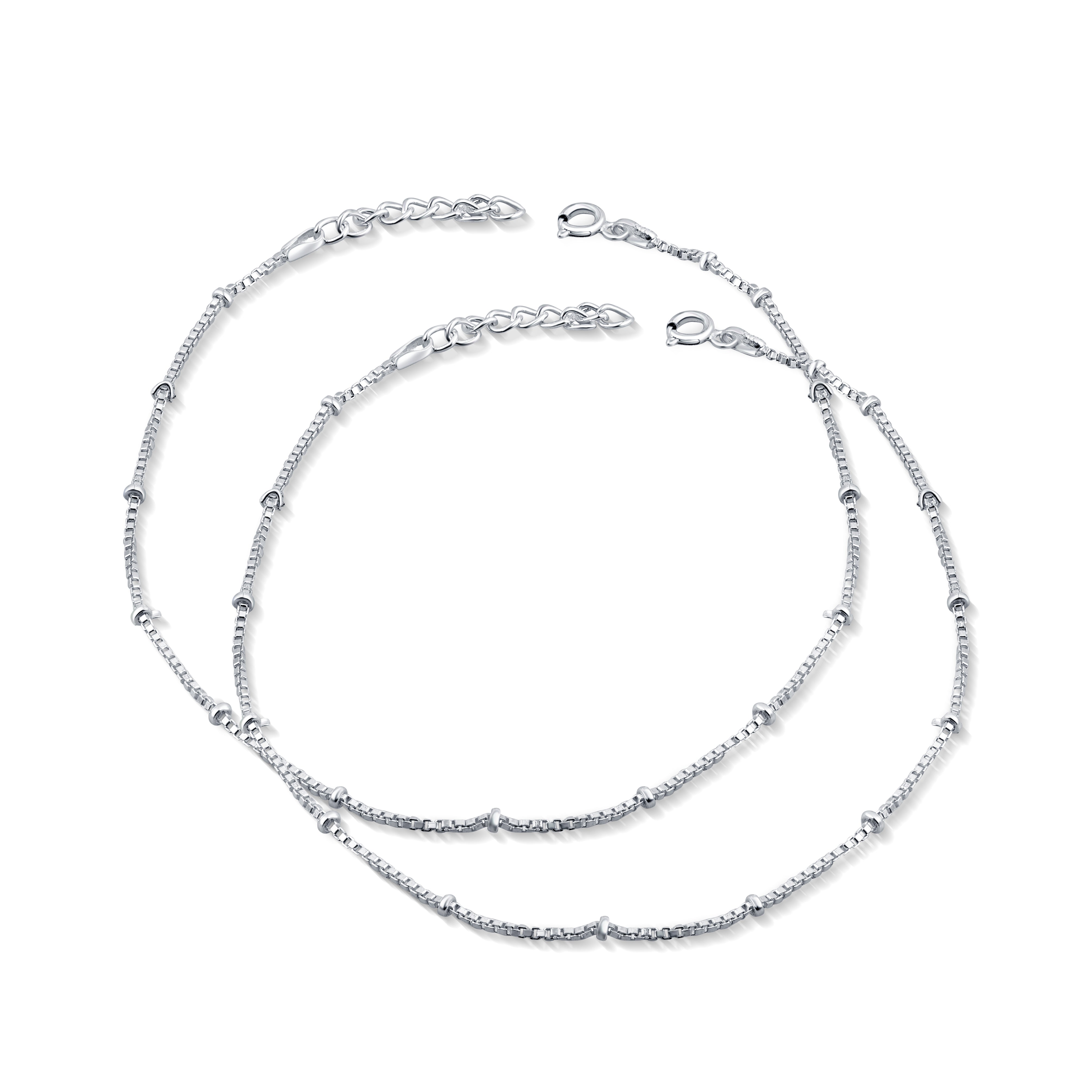 A pair of silver hook closure anklets for women.


