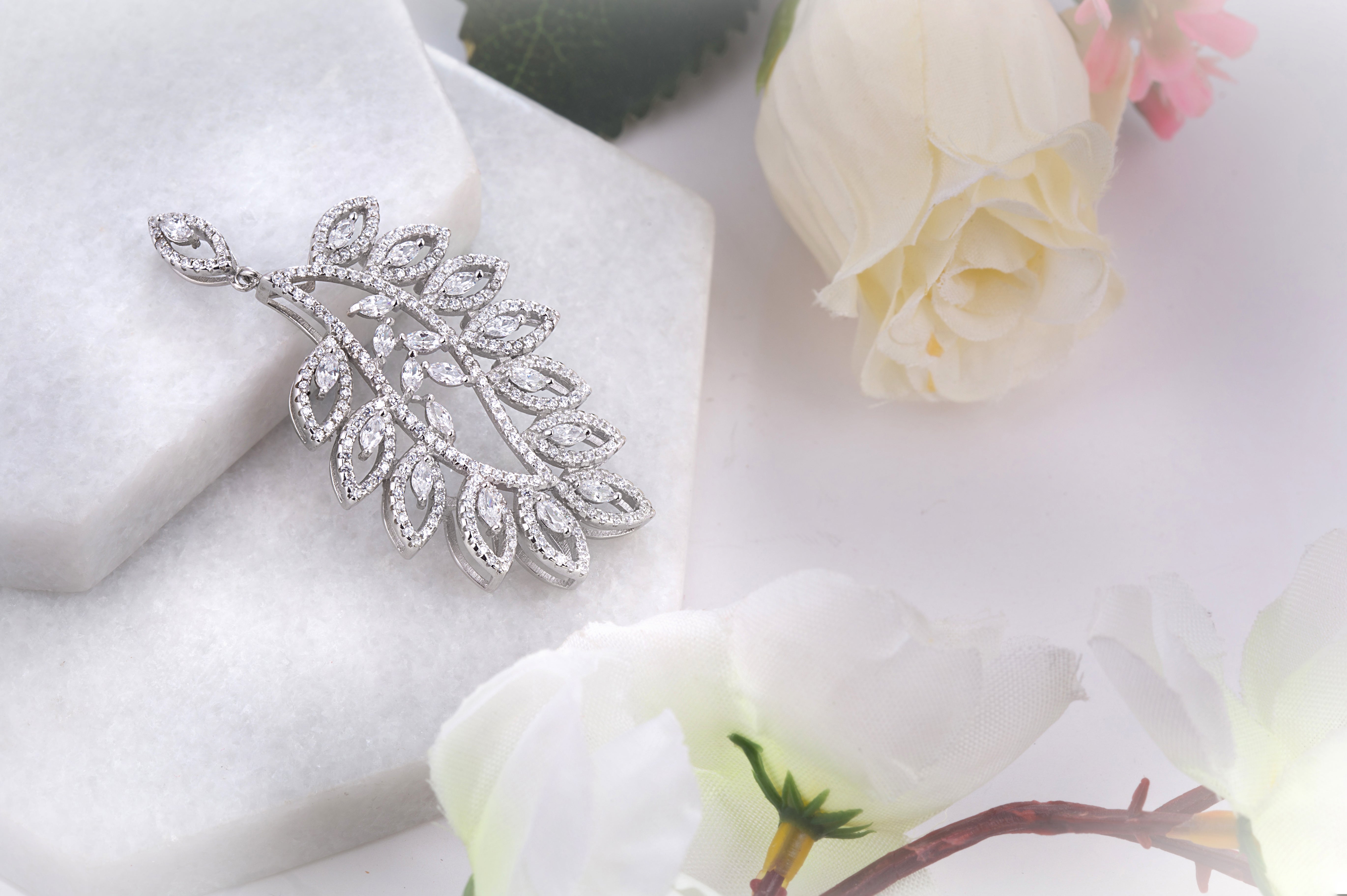 92.5 sterling silver leaf and nature inspired pendant for women studded with zirconia 